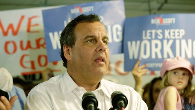 New Jersey Gov. Chris Christie addresses the crowd as he campaigns for Florida Gov. Rick Scott during a stop at the Jacaranda Italian Restaurant and Pizzeria Oct. 26, 2014, in Plantation, Fla. 