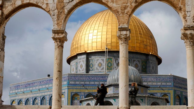 Israeli border police walk past the Dome of the Rock on the compound known to Muslims as Noble Sanctuary and to Jews as Temple Mount 