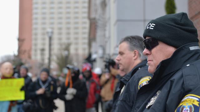 Clayton Police Department officers keep a watchful eye during a peaceful protest 