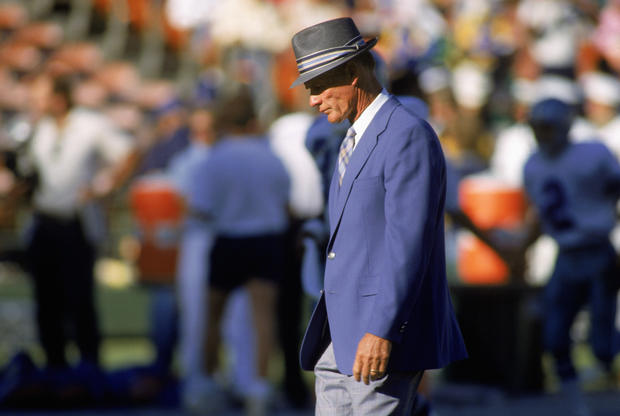 Tom Landry paces on the sideline 