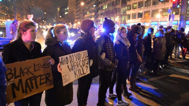 Protesters block an intersection in downtown Washington D.C. 