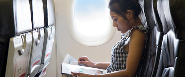 airplane seat travel 610 header magazine reading 