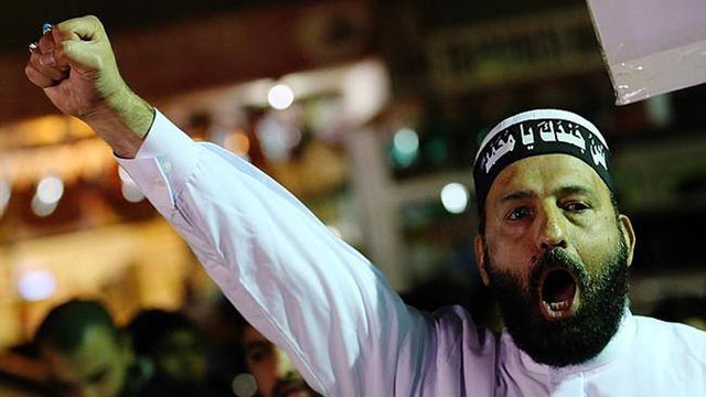 ​A photo taken from the website of self-styled Muslim cleric Man Haron Monis, shows Monis, the suspect in a siege on a Sydney 