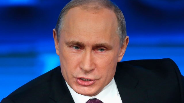 2014-12-18t093641z1132708773gm1eaci1ct001rtrmadp3russia-crisis-putin-cenbank.jpg 