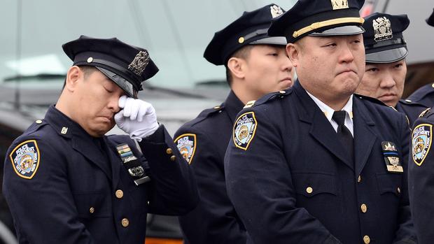 Slain NYPD officers mourned 