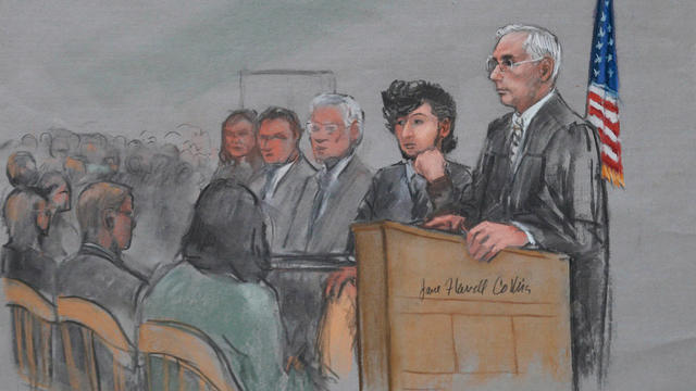 Accused Boston Marathon bomber Dzhokhar Tsarnaev, second from right, is shown in courtroom sketch on first day of jury selection in his trial at federal courthouse in Boston, January 5, 2015 