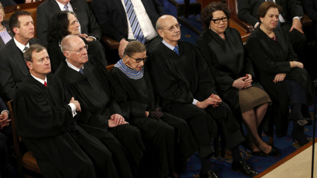 From left to right, Chief Justice of the United States John Roberts and U.S. Supreme Court Associate Justices Anthony Kennedy, Ruth Bader Ginsburg, Stephen Breyer, Elena Kagan and Sonya Sotomayor listen to President Obama as he delivers his State of the U 