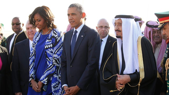 President Obama and first lady Michelle Obama are greeted by Saudi Arabia's King Salman 