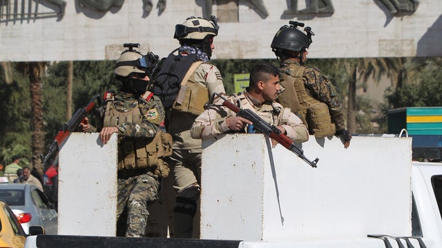 Iraqi soldiers patrol the streets in Tahrir Square in central Baghdad on Feb. 05, 2015.  