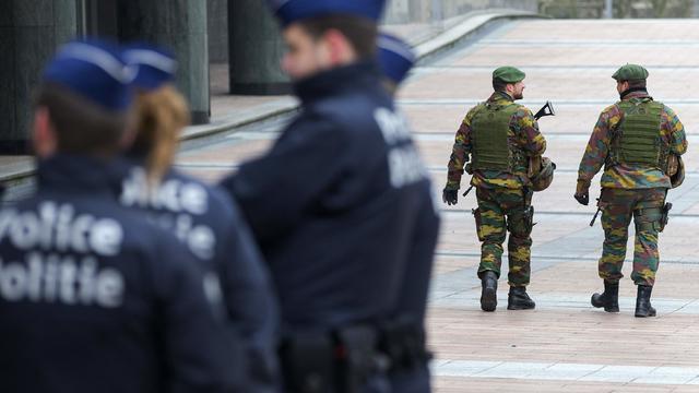 Belgian soldiers patrol outside the European Council headquarters in central Brussels 