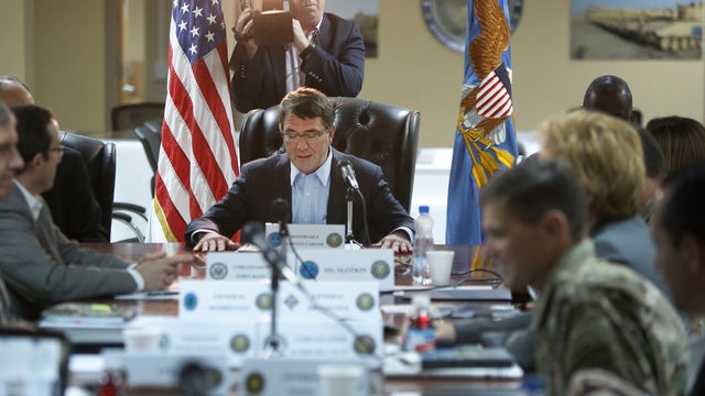 U.S. Secretary of Defense Ashton Carter (C) begins a regional security meeting at Camp Arifjan, Kuwait Feb. 23, 2015.  