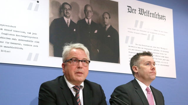 Lawyers Nicholas O'Donnell (R) and Markus H Stoetzel attend a press conference in Berlin, on Feb. 24, 2015 on the return of Guelph Treasure or "Welfenschatz" that a group of four Jewish art collectors had to sell far below their market price in 1935 under 