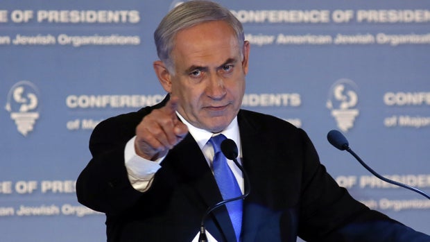 Israeli Prime Minister Benjamin Netanyahu gestures as he delivers a speech during the Presidents Conference of Major American Jewish organizations in Jerusalem Feb. 16, 2015. 