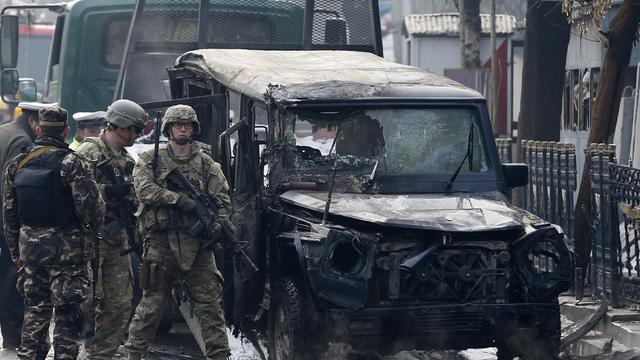 U.S. soldiers arrive at the site of a suicide attack in Kabul 