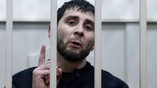 Zaur Dadayev, charged with involvement in the murder of Russian opposition figure Boris Nemtsov, speaks inside a defendants' cage in Moscow, March 8. 2015. 