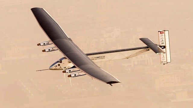 Solar Impulse 2, a solar-powered airplane, takes flight as it begins its historic round-the-world journey attempt 