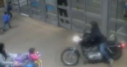 Canadian motorcyclist caught on tape riding in mall - CBS News