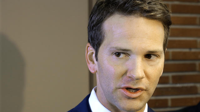 Then-U.S. Rep. Aaron Schock speaks to reporters before meetings with constituents after a week in which he faced twin scandals Feb. 6, 2015, in Peoria, Illinois. 