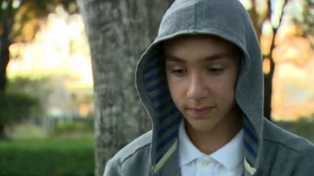 ​Deyab-Houssein Wardani, 14, is seen in an interview with CBS Miami station WFOR-TV. 