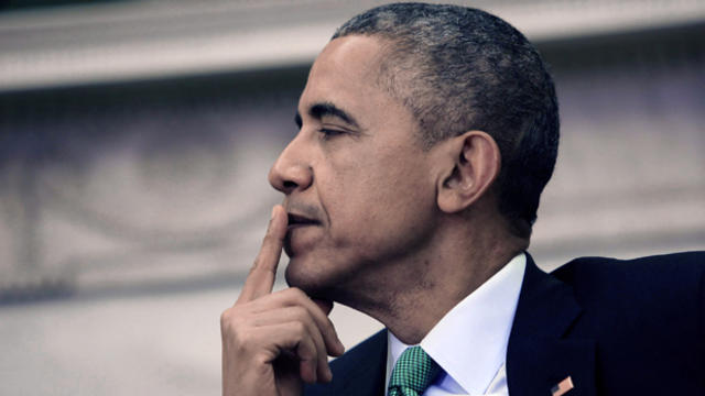 President Obama listens to Ireland Prime Minister Enda Kenny in the Oval Office March 17, 2015, in Washington. 