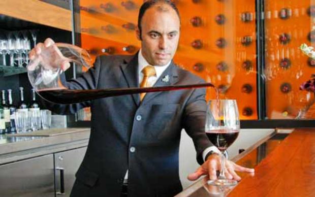 Silvestre Fernandes Pouring Wine - Copy 