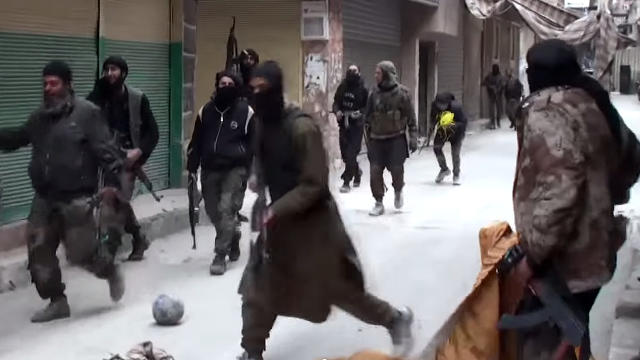 ​ISIS militants engage in street-to-street fighting in the Yarmouk Palestinian refugee camp, in southern Damascus 