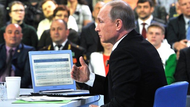 Russian President Vladimir Putin speaks during his annual televised phone-in 