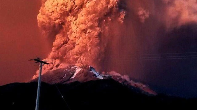 View from Puerto Varas, southern Chile, of a high column of ash and lava spewing from the Calbuco volcano 