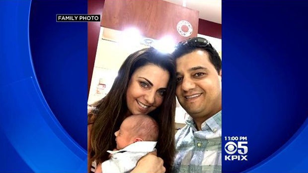 ​Haseeb and Christy Amireh are seen with their newborn son, Grayson, in this family photo. 