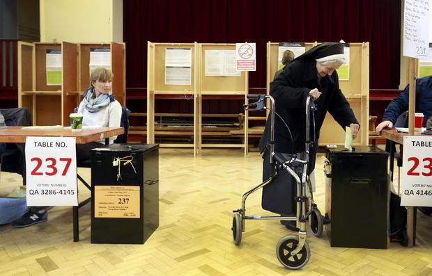 A nun votes in central Dublin as Ireland holds a referendum on same-sex marriage 