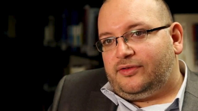 Washington Post reporter Jason Rezaian speaks in the newspaper's offices in Washington in a Nov. 6, 2013, photo provided by The Washington Post. 