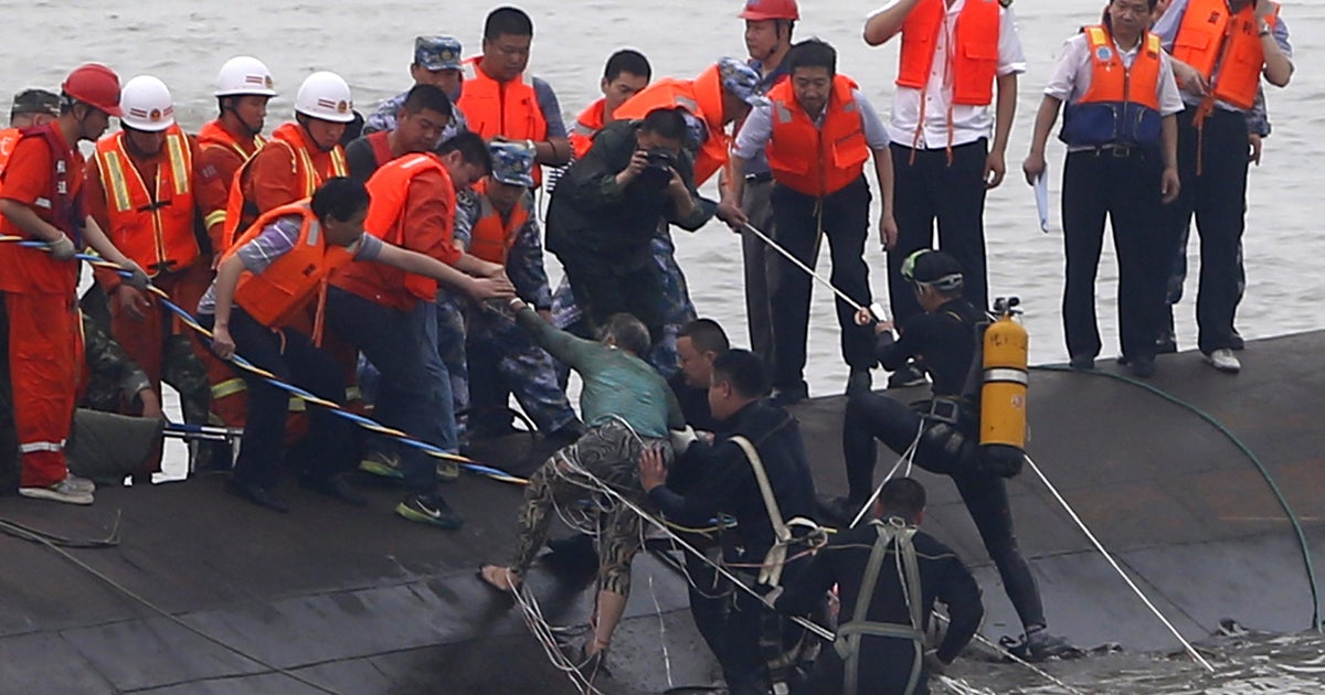 Disaster on Chinese river as cruise ship flips over CBS News