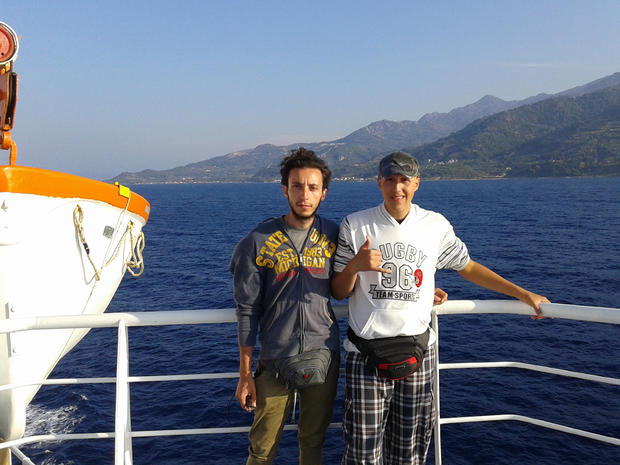 Mohammed (left) and Khaleel Turani on a boat in the Mediterranean 