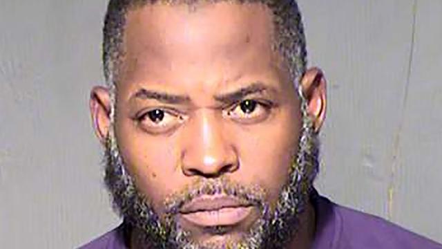 Abdul Malik Abdul Kareem, also known as Decarus Thomas, is seen in an undated booking photo released by the Maricopa County Sheriff's Office in Phoenix, Arizona. 