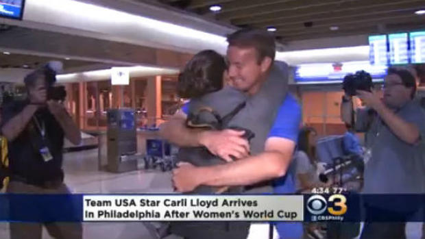 carli lloyd hug 