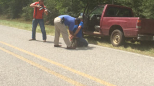 red-truck-and-possible-suspect.jpg 