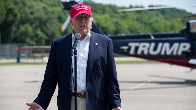 Republican presidential candidate businessman Donald Trump speaks with reporters after arriving at the Iowa State Fair Aug. 15, 2015, in Des Moines, Iowa. 