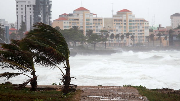 Waves crash along the shores of the Malecon in Santo Domingo, Dominican Republic, Aug. 28, 2015. 