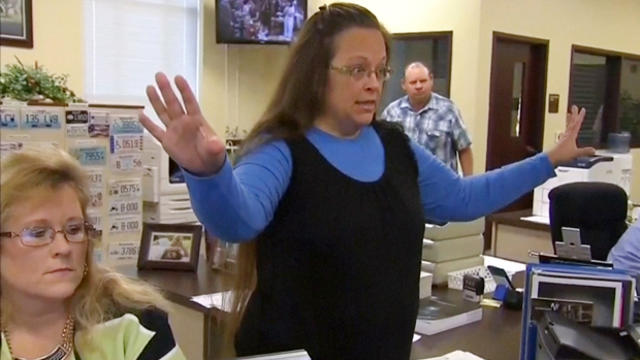 Rowan County Clerk Kim Davis gestures as she refuses to issue marriage licenses to a same-sex couple in Morehead, Kentucky, Sept. 1, 2015, in a still image from video provided by WLEX. 