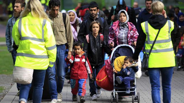 Migrants arrive at the main railway station in Dortmund, Germany 