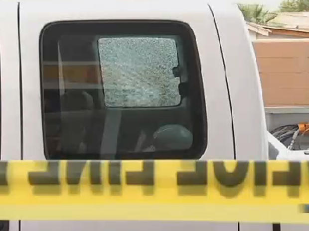 Pickup truck's shattered window is seen on September 9, 2015 after what may have been latest in string of windows being shot out while vehicles were travelling on Phoenix area highways 