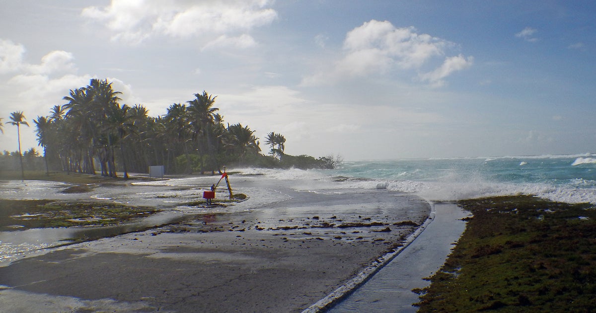 Climate change could displace half a million people from islands CBS News