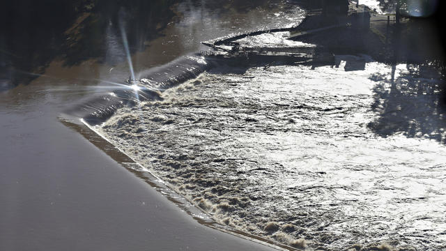 Floodwaters rush over a diversion dam in Columbia, South Carolina, Oct. 6, 2015. 