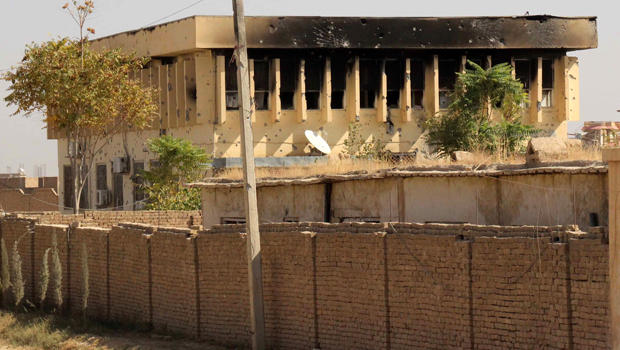 A government building damaged during the clashes between Afghan government forces and the Taliban insurgents is pictured in the northern city of Kunduz Oct. 8, 2015. 