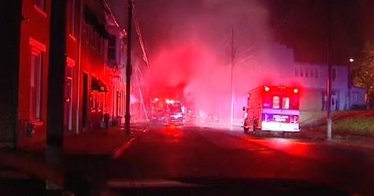 Mom, 3 kids, neighbor killed in row house fire in Kentucky - CBS News