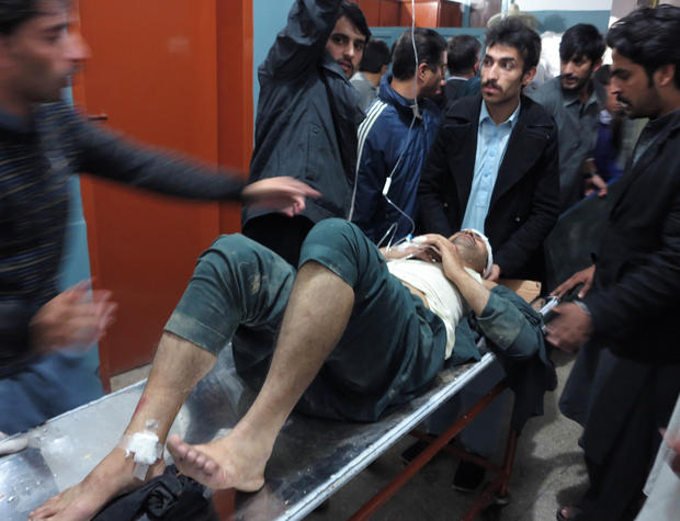 A patient is brought to a hospital after a severe earthquake was felt in Mingora, the main town of Pakistan Swat valley 