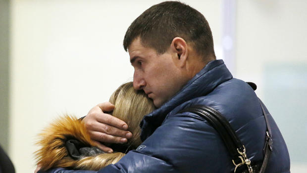 Relatives react after a Russian airliner with 217 passengers and seven crew aboard crashed as people gather at Russian airline Kogalymavia's information desk at Pulkovo airport in St. Petersburg, Russia, Oct. 31, 2015. 
