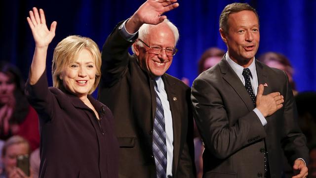 Democratic presidential candidates Hillary Clinton, Bernie Sanders, center, and Martin O'Malley wave to the crowd following the First in the South Presidential Candidates Forum held at Winthrop University in Rock Hill, South Carolina, Nov. 6, 2015. 