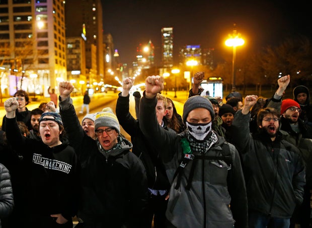 Demonstrators chant as they walk the streets during protests in Chicago, Illinois, Nov. 24, 2015, reacting to the release of a police video of the 2014 shooting of a black teenager, Laquan McDonald, by a white police officer, Jason Van Dyke.