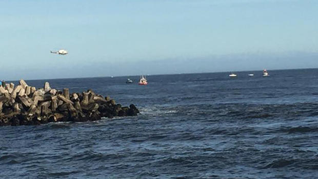 manasquan inlet boat capsizes 